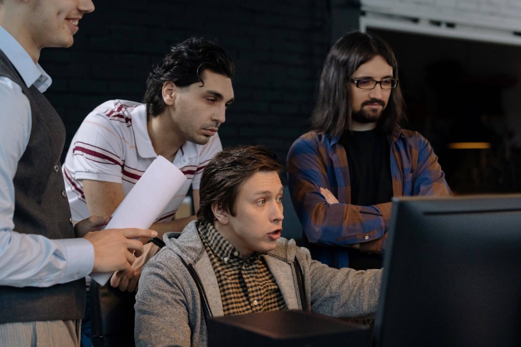 Designers and developers collaborating on UX
